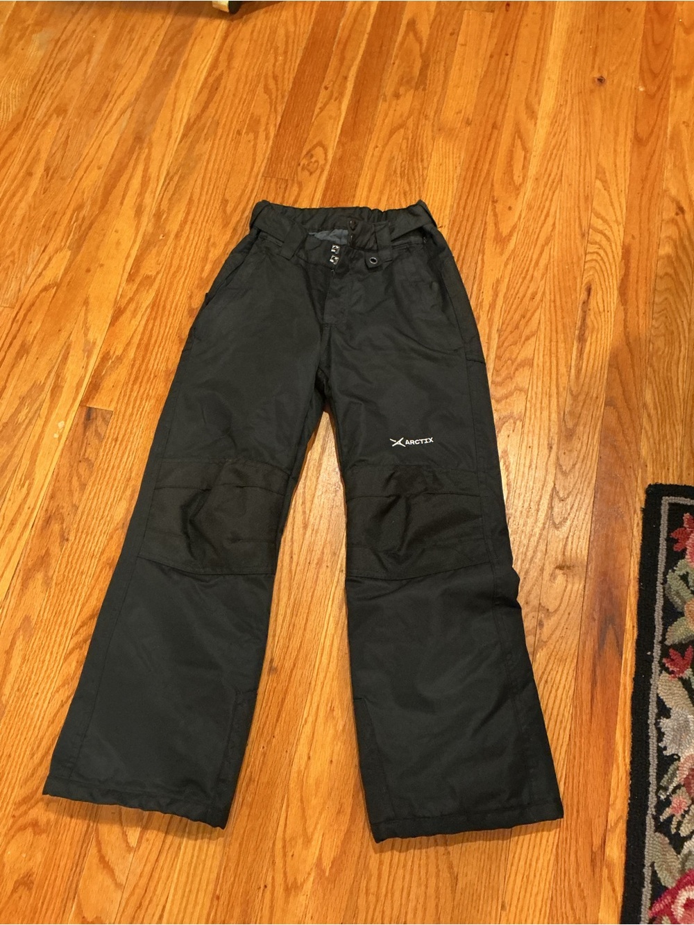 Arctix Kids Black Snow Pants - Insulated Winter Bottoms Unisex size Med (10-12)